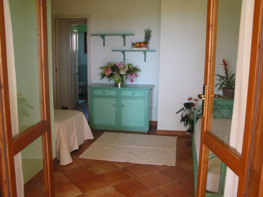 Villaggio Piscina Rei Monte Nai Habitación foto